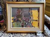 Full view of painting in frame on patterned chair, showing overall condition and presentation.