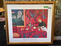 Full image of framed art poster showing colorful interior scene by Henri Matisse