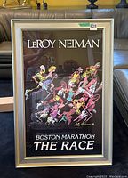 Full view of framed Boston Marathon poster featuring colorful illustration of runners by LeRoy Neiman.