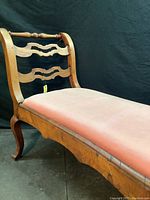 Side view showing cabriole legs, walnut veneer chassis, upholstery condition