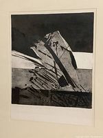 Close-up of the aquatint print showing abstract black and gray geometric shapes.