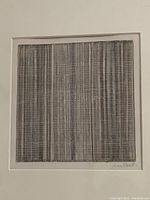 Close-up of abstract grid metalpoint drawing with intersecting vertical and horizontal lines and muted gray tones
