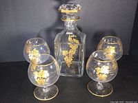 Overall view of decanter, snifters and spoons