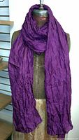 Single purple 100% silk scarf displayed on a mannequin, showing texture and length.