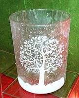 Glass Tree of Life candle holder, cylindrical, decorated with white tree and snow design