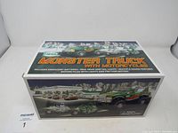 Box front showing Hess Monster Truck with Motorcycles logo and features