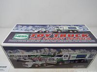 Box showing the Hess Toy Truck and Front Loader in original packaging with product features listed.