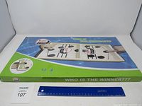 Top view of the Super Winner Game closed in its box showing the board and playing layout