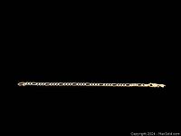 Full view of thin yellow gold chain bracelet with linked chain and lobster clasp.