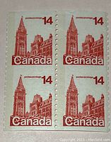 Front view of block four 14-cent Canadian stamps showing missing horizontal perforations