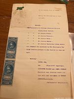 Photo of the front of the document showing $5.00 blue Canada law stamps and typed text from the Supreme Court case, dated 1887.