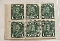 Front view of block of six 1 cent King George V Canadian postage stamps in dark green, mint condition, perforated edges