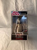 Front view of the boxed Enchantress Rock Candy vinyl figure from Suicide Squad, showing the figure and packaging condition.