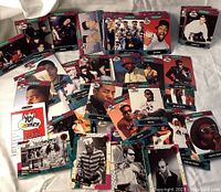 Photo showing spread of colorful MTV Raps trading cards featuring various hip-hop artists such as Public Enemy, Biz Markie, Ice Ice Baby, De La Soul, and Digital Underground.
