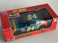 Boxed 1998 Revell Select Jeff Gordon #24 DuPont diecast NASCAR car showing front and top view through packaging window.