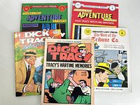 Photo showing six Dick Tracy comic books with various titles and colorful vintage-style covers.
