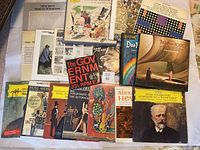 Multiple vinyl records and album covers laid out on a surface featuring different classical and modern compositions. Includes an EP by Nash the Slash and works by Steve Reich, Tchaikovsky, and Schoenberg among others.