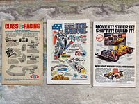 Back covers of three vintage Marvel comics with advertisements for Class A Racing and LEGO Expert Builder sets. The photos show wear on covers and old ads from the comic books.