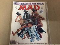 Front cover of the MAD magazine December 1978 issue No. 203 with Star Wars themed parody characters wearing top hats.