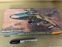 View of front box art showing MiG-27 Flogger D aircraft illustration and branding.