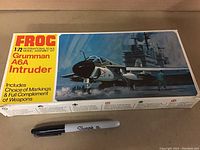 Front view of the FROG Grumman A6A Intruder model kit box with a Sharpie pen for scale reference.