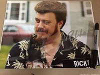 Front view of the 8x10 signed photo showing Ricky wearing his signature shirt and the signature by Robb Wells.