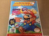 Front cover of Nintendo Power Magazine issue #54 showing Super Mario All-Stars artwork on cover.