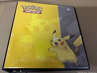 Front view of the Pokemon Trading Card Game Album showing Pikachu artwork on the cover.