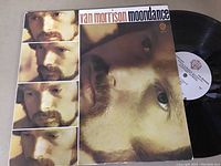 Front cover of gatefold LP featuring Van Morrison's face in multiple frames, with vinyl record partially visible.