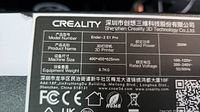 Close-up of Creality Ender-3 S1 Pro label showing model number, power rating, size and voltage specs