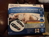 Box of Dr Ho's Circulation Promoter showing product name, features, and benefits on front panel.
