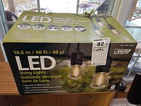 Box showing overall packaging and length of string lights