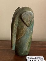 Front-facing view of the elephant sculpture showing overall shape and trunk profile