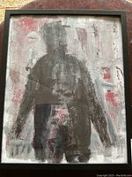 Front view of the abstract canvas painting showing the dark figure centered with a mixed color background and visible canvas texture.