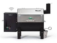 Front view of grill closed showing digital controller, WiFi antenna, stainless steel lid and chimney