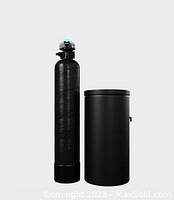 Front view of tall black resin tank with green DROP control head next to shorter black brine tank