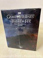 Front sealed cover of the Game of Thrones Complete Series Blu-ray set showing title and HBO logo.