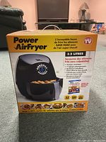 Front view of Power Air Fryer box showing model with 3.2 liters capacity, branding, and product features in French and English.