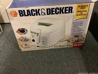 Box front with product image and brand name showing the White FryMate Plus DF251 deep fryer.