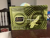 Box front with DM2 logo and features like mix, scratch, warp