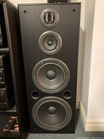 Front view of a Technics SB-A38 floor speaker showing four drivers.