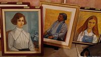 Photo showing all three framed portrait paintings by Martha Oldham arranged together, showing scale and framing.