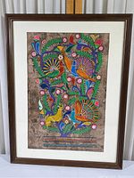 Framed colorful painting of birds and flowers on handmade paper with hand-cut mat and wooden frame