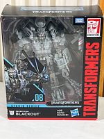 Front view of the sealed Transformers Studio Series Decepticon Blackout figure box showing the large window with figure inside and box graphics.