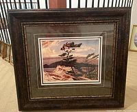 Full view of framed print showing wood frame, matting, glass front and overall scene