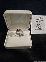 Ring in JCPenney box with price tag and lot number card visible