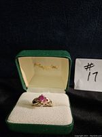 Ring displayed in original green Mappins box with #17 label visible