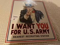 Front view of the sealed reproduction tin sign featuring Uncle Sam and recruitment message.