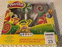 Boxed Play-Doh Lollipop Set showing four colorful swirl molded clay compounds resembling lollipops with sticks