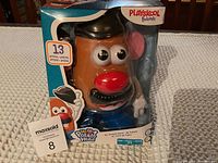 Front view of Playskool Friends Mr Potato Head in original box displaying 13 pieces.